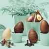 Chocolate Easter eggs on a mint green set