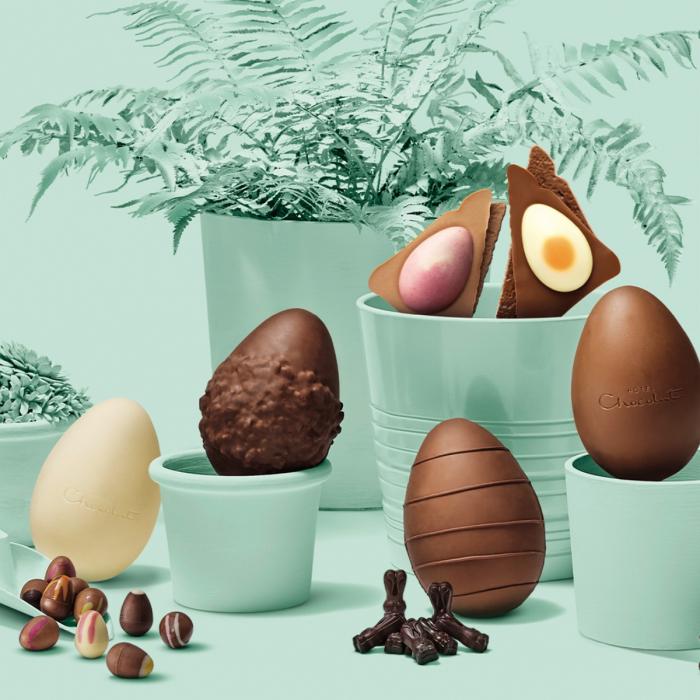 Chocolate Easter eggs on a mint green set