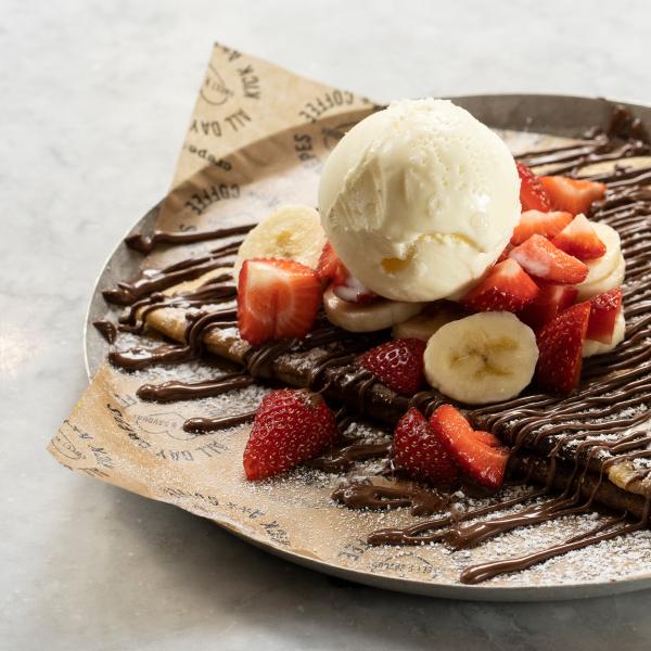Crepe with strawberries and ice cream